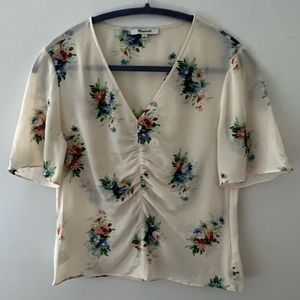 Madewell women’s 100% silk short sleeve floral blouse.